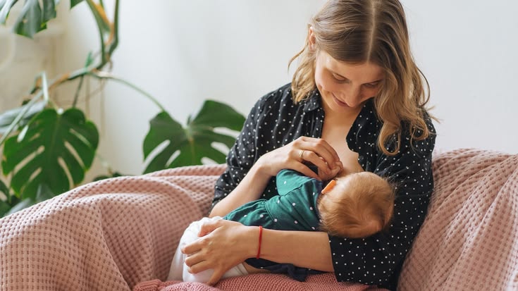 Mother breastfeeding her baby